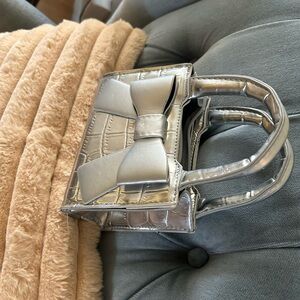 Chic Silver Mini Bag with Bow Accent